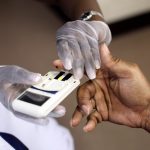NEWARK, NJ - AUGUST 13:  A mans finger is pricked to test his cholesterol at the City of Newark's free homeless health fair at the Department of Child and Family Well-Being on August 13, 2009 in Newark, New Jersey.  The Department of Child and Family Well-Being in partnership with other health organizations gave free medical examinations to the homeless including screening for high blood pressure, cancer, and diabetes.  (Photo by Rick Gershon/Getty Images)